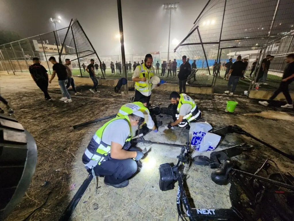ZAKA volunteers work to gather the bodies and remnants of the victims in Majdal Shams, and protect the dignity of the dead.